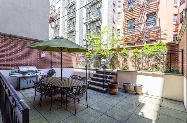 111 W 113th St Unit 4B, New York City, NY 10026 - view of patio / terrace with a grill and outdoor dining area