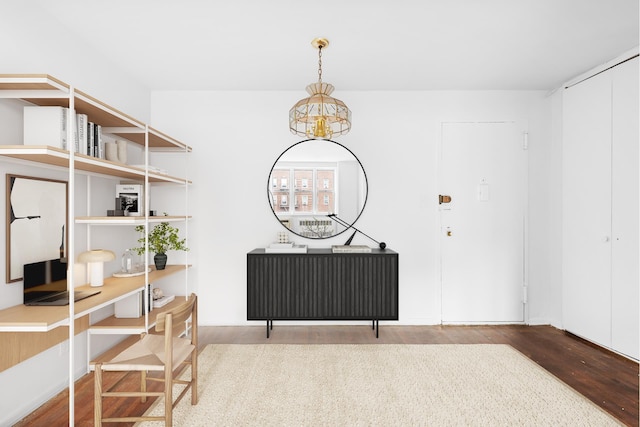 400 E 17th St Unit 608, New York City, NY 11226 - dining room featuring wood finished floors and a chandelier