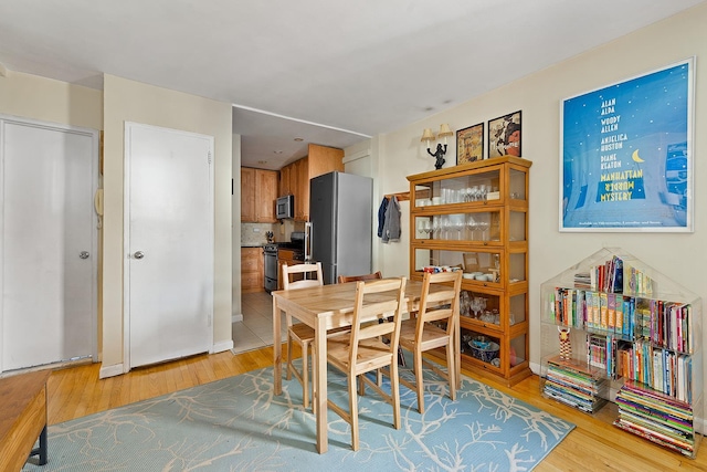 439 E 88th St Unit 5B, New York City, NY 10128 - dining space with light wood finished floors