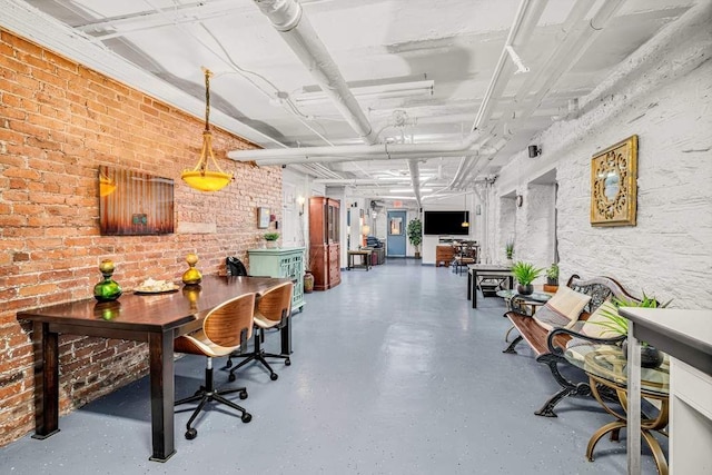 26 W 97th St Unit 3A, New York City, NY 10025 - home office with finished concrete flooring and brick wall