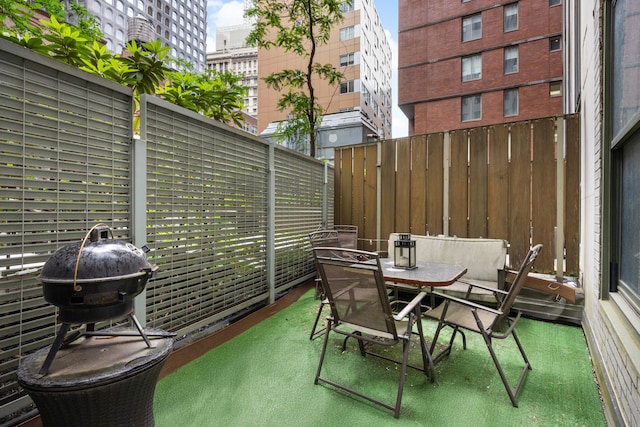 99 John St Unit 524, New York City, NY 10038 - view of patio / terrace with outdoor dining area and area for grilling
