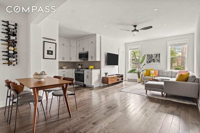 72-17 34th Ave Unit 1P, New York City, NY 11372 - living room featuring dark wood-style flooring, a ceiling fan, and recessed lighting