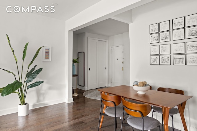 72-17 34th Ave Unit 1P, New York City, NY 11372 - dining room featuring wood finished floors and baseboards