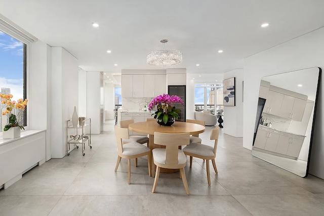422 E 72nd St Unit 37Ad, New York City, NY 10021 - dining room featuring recessed lighting and a chandelier