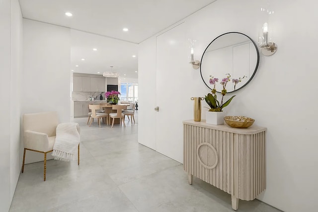 422 E 72nd St Unit 37Ad, New York City, NY 10021 - hall featuring recessed lighting and finished concrete floors