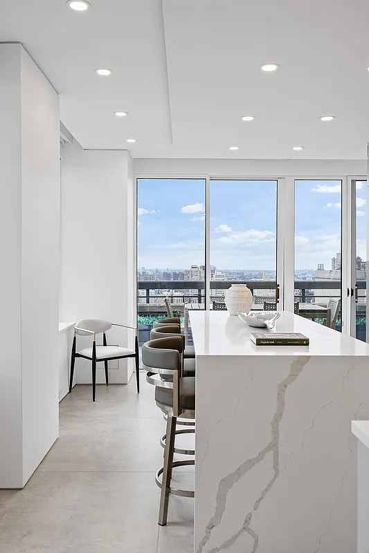 422 E 72nd St Unit 37Ad, New York City, NY 10021 - dining space featuring a view of city, recessed lighting, and finished concrete floors
