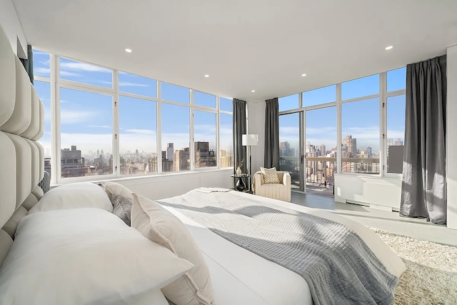 422 E 72nd St Unit 37Ad, New York City, NY 10021 - bedroom with a skyline view and access to outside