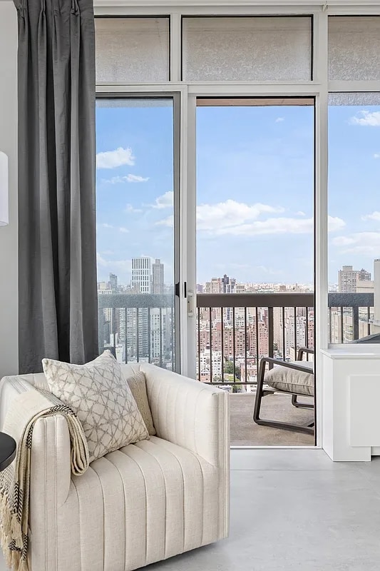 422 E 72nd St Unit 37Ad, New York City, NY 10021 - sunroom / solarium featuring a city view