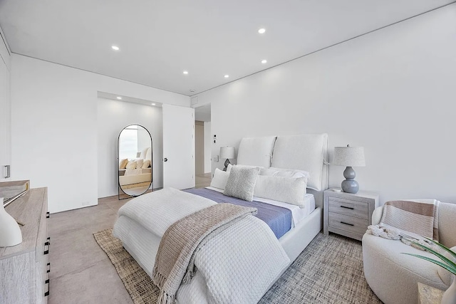 422 E 72nd St Unit 37Ad, New York City, NY 10021 - bedroom featuring concrete floors and recessed lighting