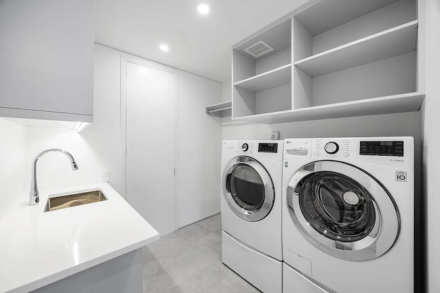 422 E 72nd St Unit 37Ad, New York City, NY 10021 - laundry area featuring separate washer and dryer and recessed lighting