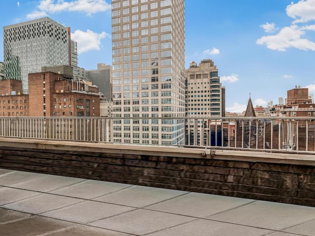 333 E 66th St Unit 12-C, New York City, NY 10065 - view of patio / terrace with a view of skyline