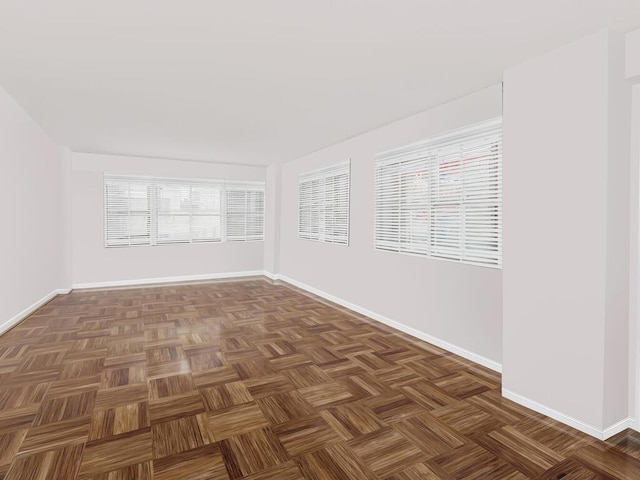 333 E 66th St Unit 12-C, New York City, NY 10065 - unfurnished room featuring baseboards and healthy amount of natural light