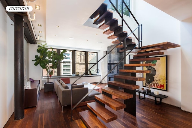 345 W 13th St Unit Ph6B, New York City, NY 10014 - stairway with healthy amount of natural light and wood finished floors