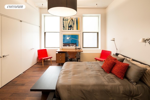 345 W 13th St Unit Ph6B, New York City, NY 10014 - bedroom with multiple windows and wood finished floors