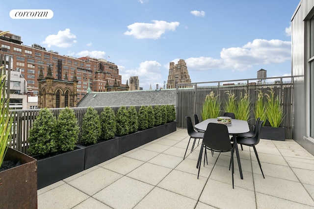345 W 13th St Unit Ph6B, New York City, NY 10014 - view of patio / terrace featuring a balcony, a city view, and outdoor dining area