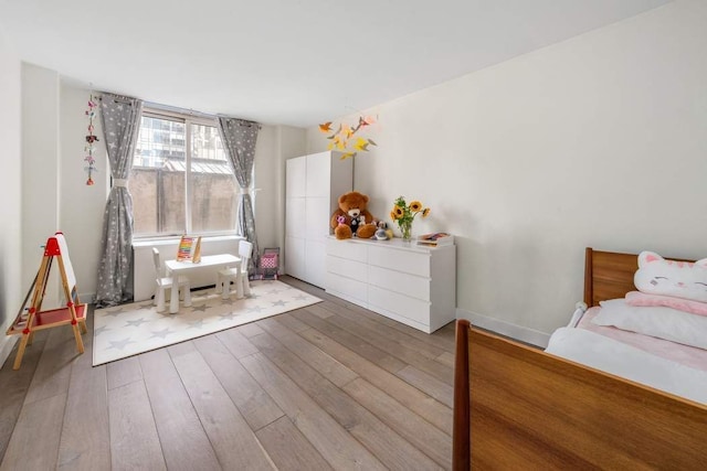 170 E 87th St Unit W8D, New York City, NY 10028 - bedroom featuring hardwood / wood-style flooring