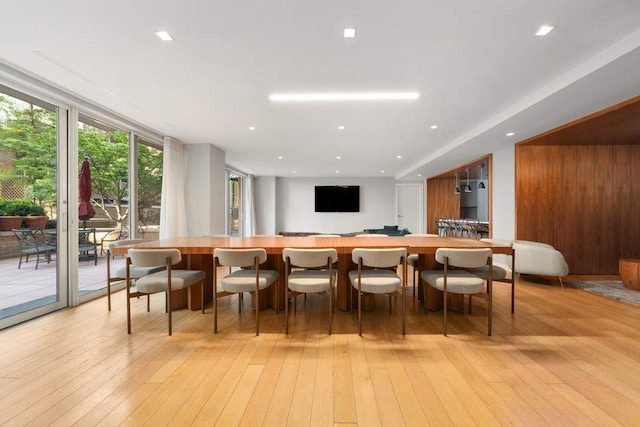 170 E 87th St Unit W8D, New York City, NY 10028 - dining room featuring light wood finished floors