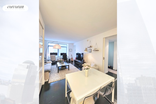 123 Washington St Unit 35E, New York City, NY 10006 - dining space featuring dark wood-type flooring and baseboards