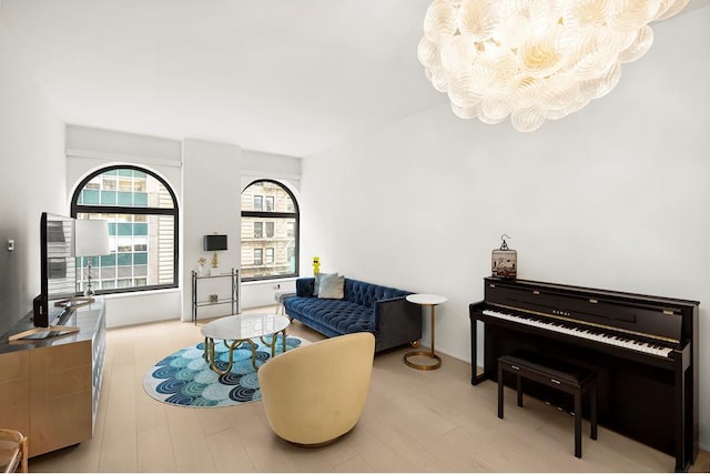 130 William St Unit 10-F, New York City, NY 10038 - living area featuring wood finished floors and a chandelier