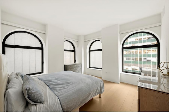 130 William St Unit 10-F, New York City, NY 10038 - bedroom featuring light wood finished floors