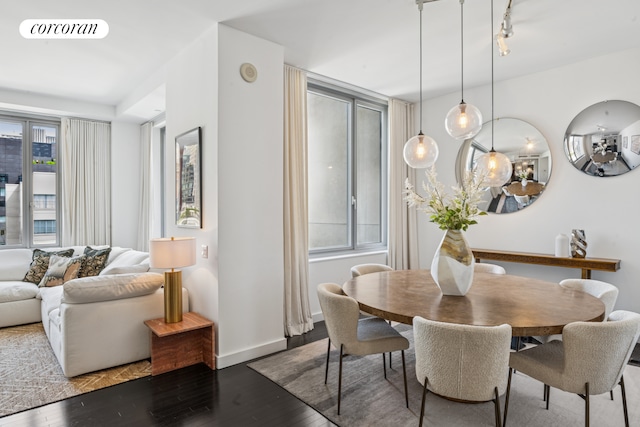 85 W Broadway Unit 11S, New York City, NY 10007 - dining area featuring wood finished floors and baseboards