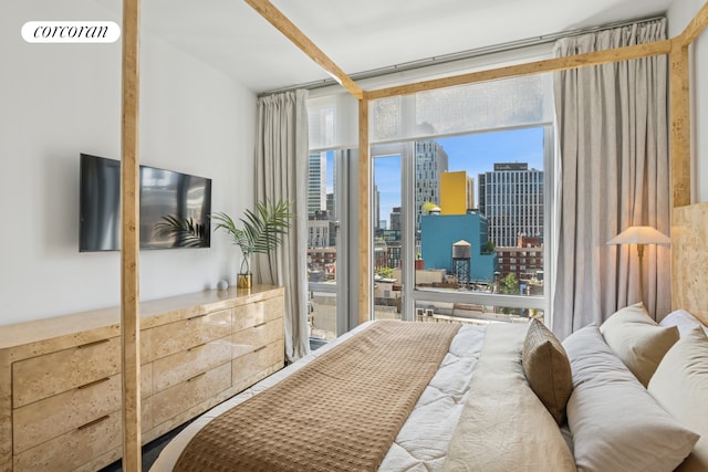 85 W Broadway Unit 11S, New York City, NY 10007 - bedroom with multiple windows and a wall of windows