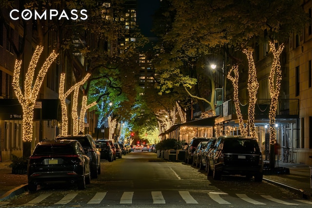 40 W 67th St Unit 1A, New York City, NY 10023 - view of asphalt road with sidewalks and street lighting