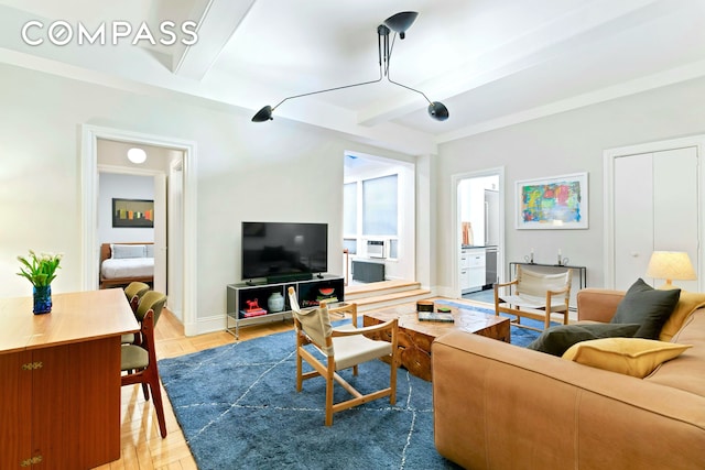 40 W 67th St Unit 1A, New York City, NY 10023 - living area with beam ceiling, baseboards, and cooling unit