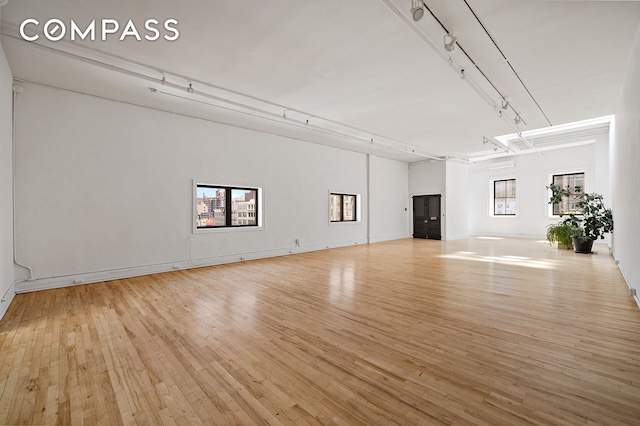 47 Howard St Unit 5, New York City, NY 10013 - unfurnished living room with light wood-type flooring