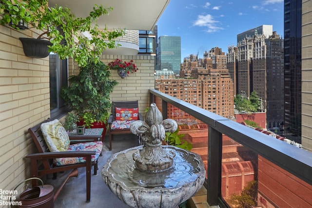 311 E 38th St Unit 18C, New York City, NY 10016 - balcony featuring a skyline view