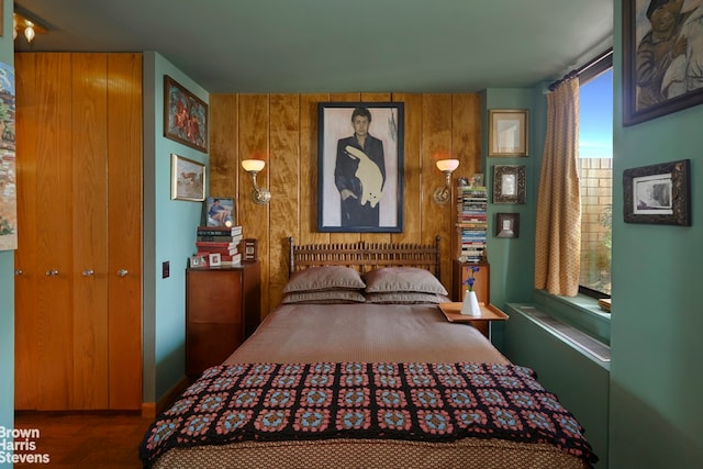 311 E 38th St Unit 18C, New York City, NY 10016 - bedroom with wood walls and wood finished floors