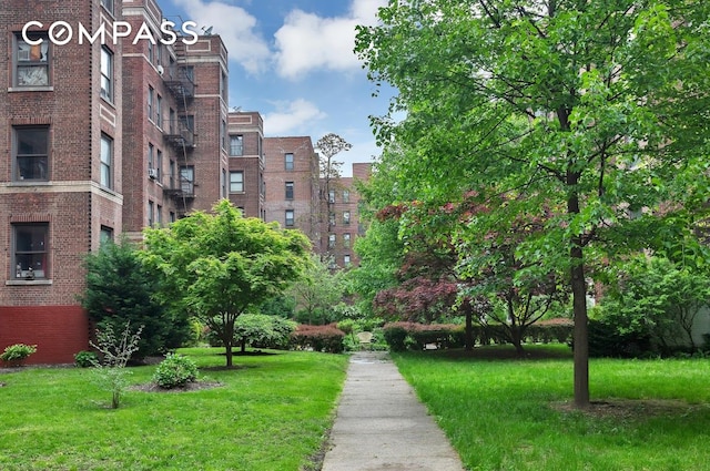 37-28 80th St Unit 32, New York City, NY 11372 - view of community with a yard