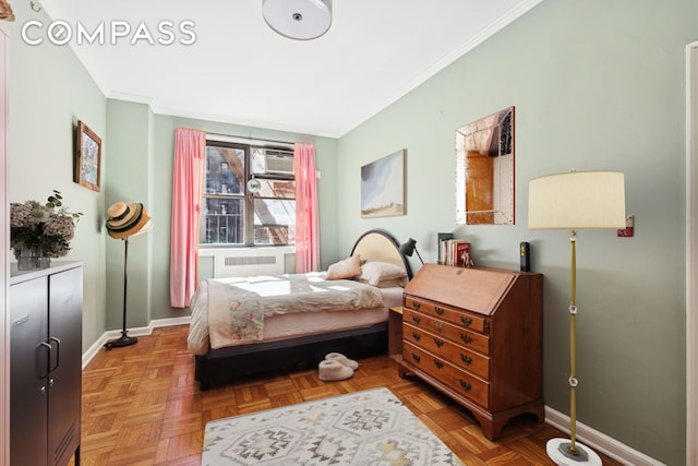 158-18 Riverside Dr W Unit 2M, New York City, NY 10032 - bedroom with ornamental molding, baseboards, a wall mounted AC, and radiator
