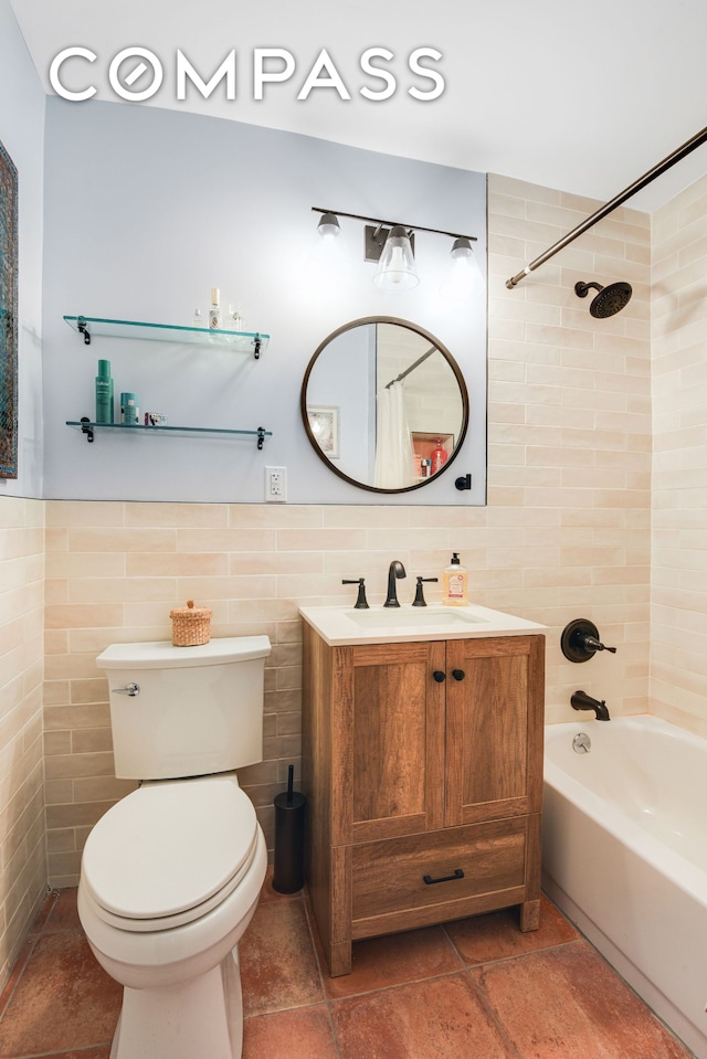 400 E 17th St Unit 711, New York City, NY 11226 - bathroom with tile walls, vanity, and shower / bath combo with shower curtain