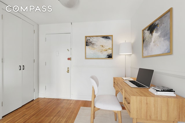 400 E 17th St Unit 711, New York City, NY 11226 - home office featuring wood finished floors
