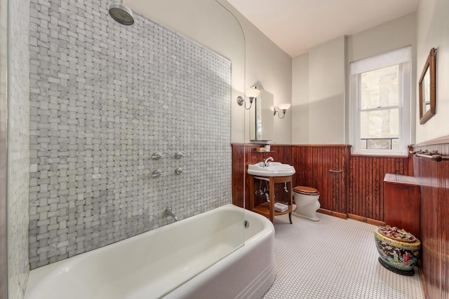 1 Lexington Ave Unit 1/2D, New York City, NY 10010 - full bath featuring a wainscoted wall, toilet, and bathtub / shower combination