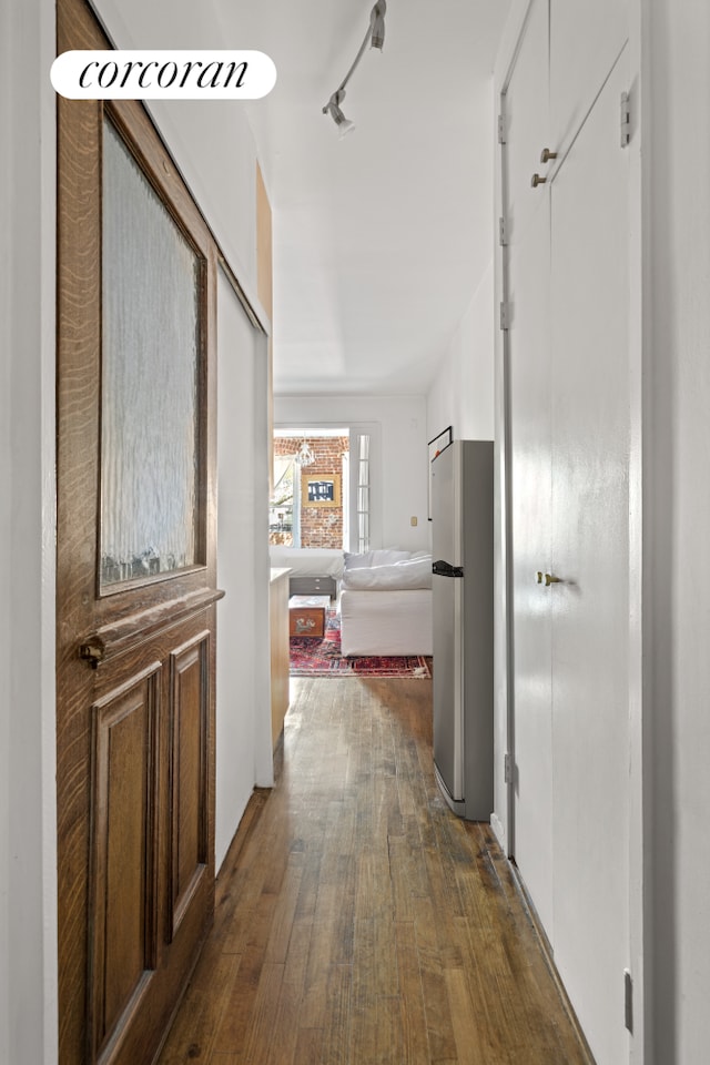 77 Perry St Unit 4C, New York City, NY 10014 - corridor featuring dark wood-style floors