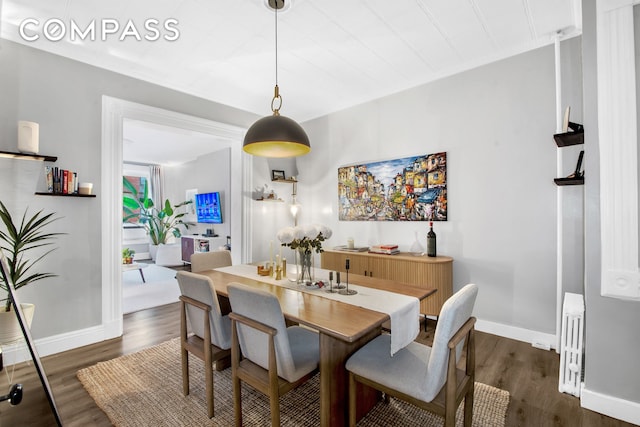 545 10th St, New York City, NY 11215 - dining space featuring dark wood finished floors and baseboards