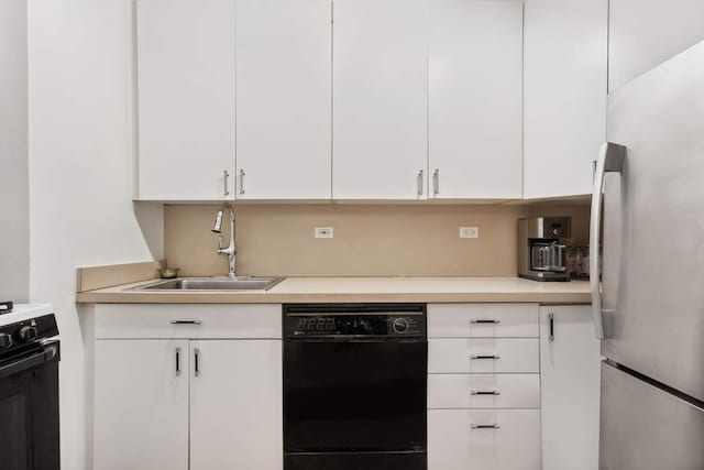 25 Sutton Pl S Unit 16L, New York City, NY 10022 - kitchen with black appliances, a sink, light countertops, and white cabinets