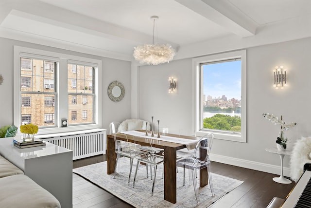 10 W 86th St Unit 15A, New York City, NY 10024 - dining space featuring radiator, beam ceiling, dark wood-style floors, a chandelier, and baseboards