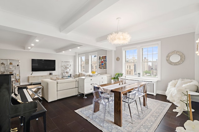10 W 86th St Unit 15A, New York City, NY 10024 - dining space with beam ceiling, a chandelier, dark wood-type flooring, radiator heating unit, and baseboards