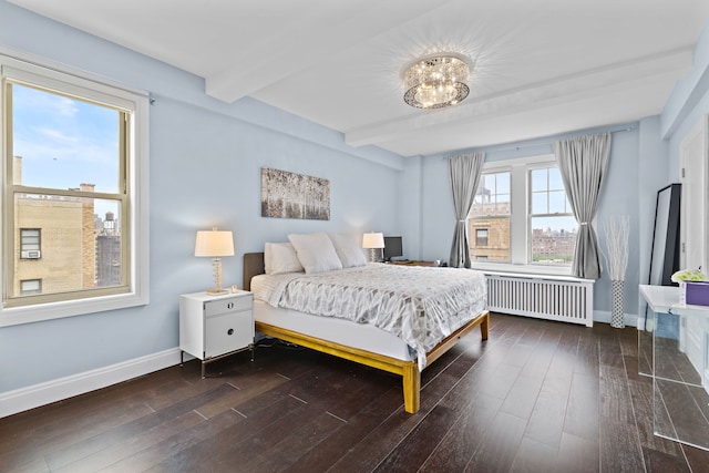 10 W 86th St Unit 15A, New York City, NY 10024 - bedroom with radiator heating unit, baseboards, beamed ceiling, wood finished floors, and a chandelier