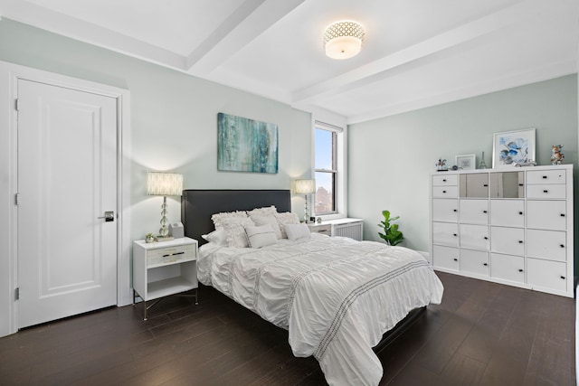 10 W 86th St Unit 15A, New York City, NY 10024 - bedroom featuring beam ceiling and dark wood-style flooring