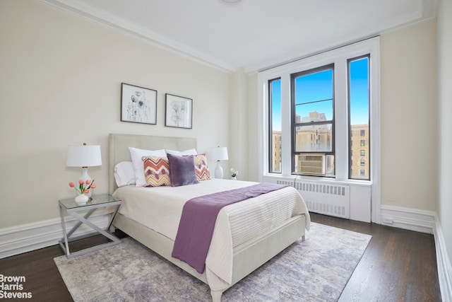 970 Park Ave Unit 8N, New York City, NY 10028 - bedroom with radiator, ornamental molding, wood finished floors, and cooling unit