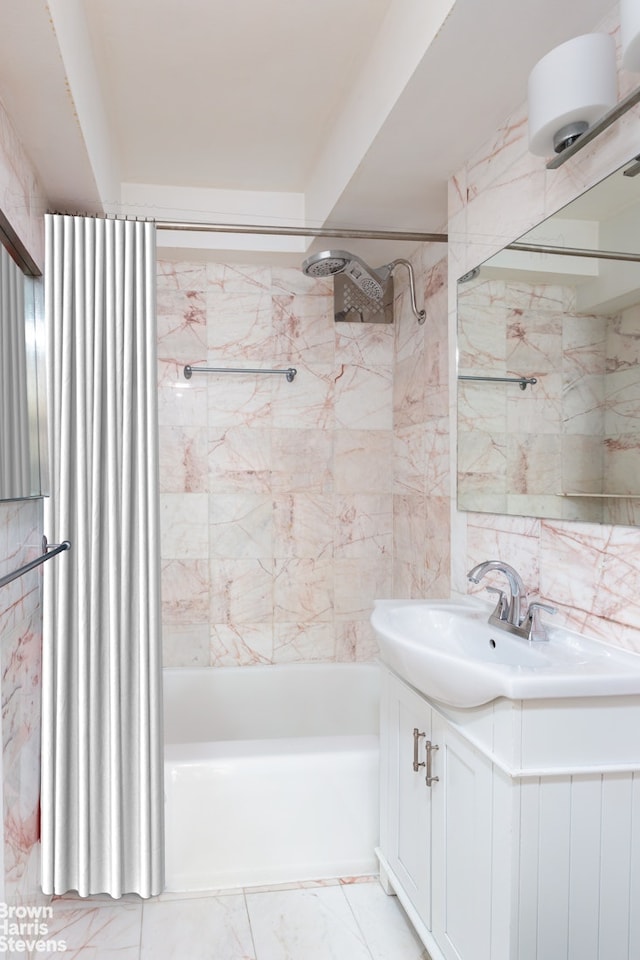 249 E 48th St Unit 3A, New York City, NY 10017 - full bath featuring shower / tub combo, vanity, and marble finish floors