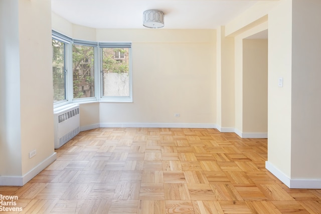 249 E 48th St Unit 3A, New York City, NY 10017 - unfurnished room featuring radiator and baseboards