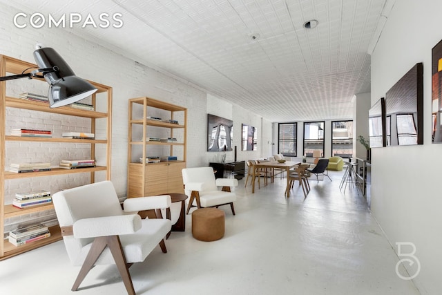 100 Wooster St Unit 4, New York City, NY 10012 - living area featuring concrete flooring
