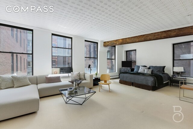 100 Wooster St Unit 4, New York City, NY 10012 - bedroom with carpet flooring and baseboard heating