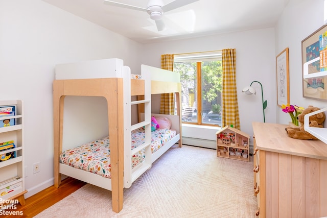 20 Jackson Pl Unit 3, New York City, NY 11215 - bedroom featuring wood finished floors, a baseboard heating unit, and ceiling fan