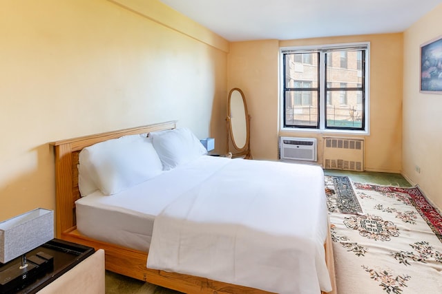 100-25 Queens Blvd Unit 2Aa, New York City, NY 11375 - carpeted bedroom featuring radiator heating unit and a wall mounted AC